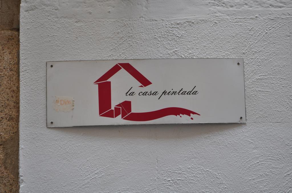 Apartamentos La Casa Pintada Caces Exterior foto